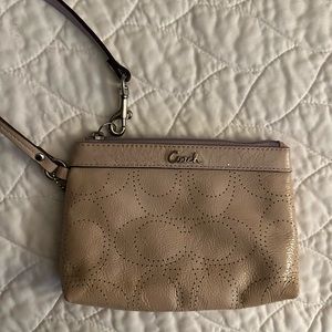 Tan and Purple Coach wristlet